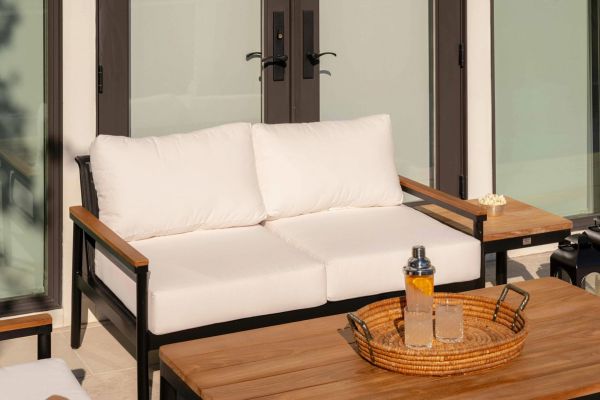 HC Luxury Montauk Sofa black and brown sofa with white cushions
