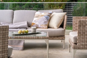 Beige sofa with light grey cushions