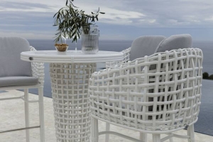 White patio chair with grey cushions