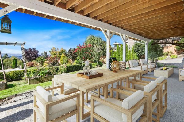 Luxury Outdoor Dining outdoor patio with wooden outdoor dining set