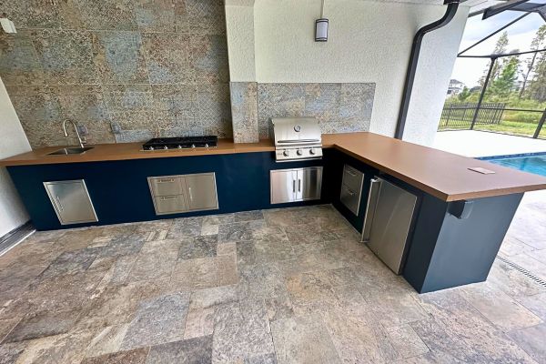 Outdoor Kitchen with Navy Cabinets