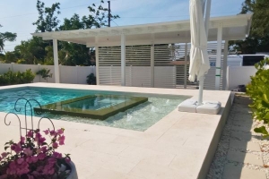 Poolside white pergola